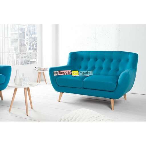 i love the idea of using a blue couch.