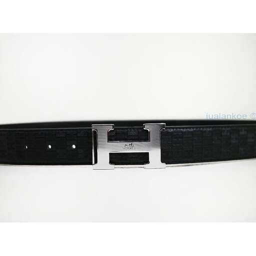 a black leather belt with a silver buckle.