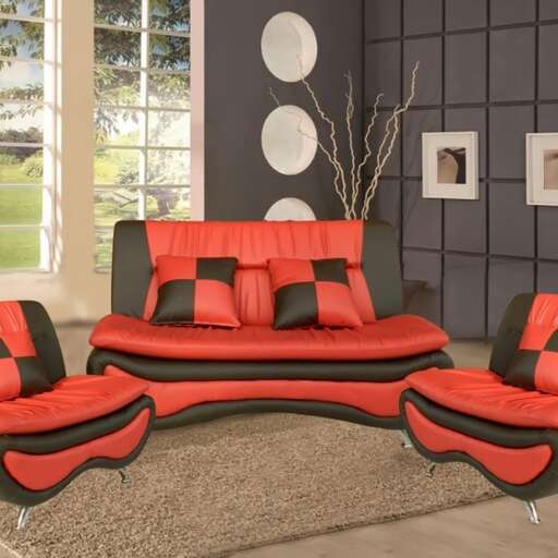 a set of three couches in a living room.