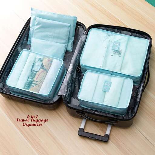 a couple of open suitcases with a strap.