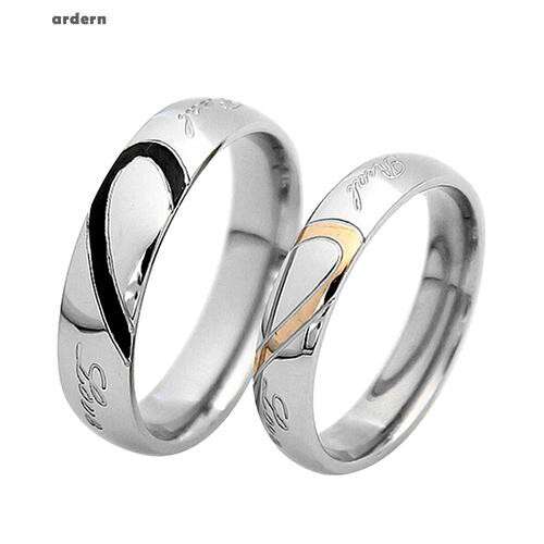 a pair of men's wedding rings
