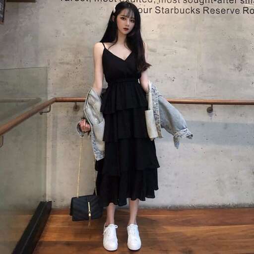 a girl in a black dress