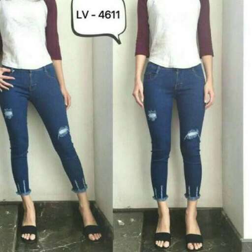 jeans with a white vest