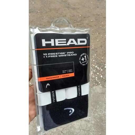 a plastic bag with a head inside