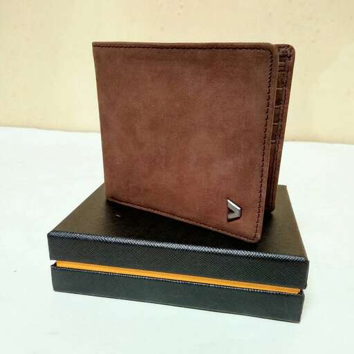a brown leather wallet with a yellow stripe on the front.