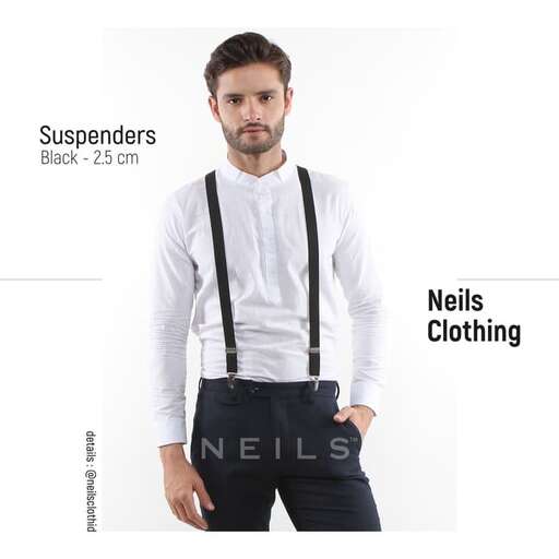 a man in a white shirt and suspenders