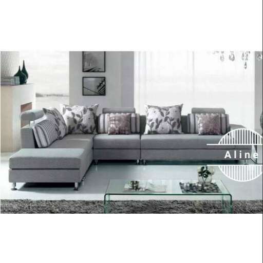 a modern living room with a sofa and coffee table.