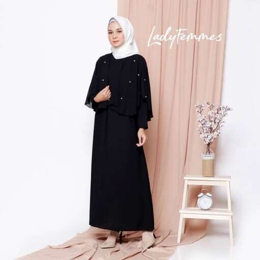 a plus size black dress with a long neck