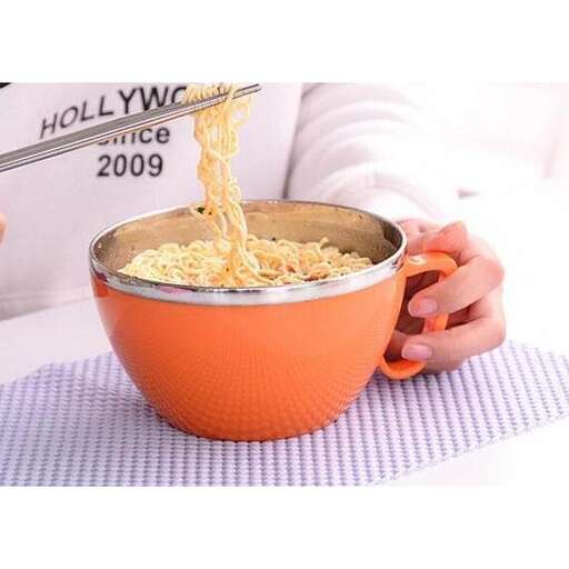 a person is stirring a bowl of noodles.