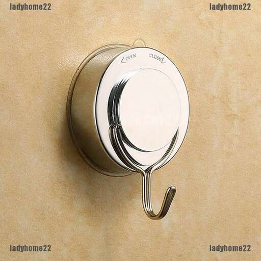 a clock with a black design on the inside of it.