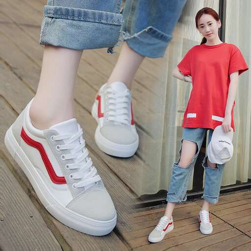 a girl in a red t - shirt and jeans, sneakers, and sneakers.