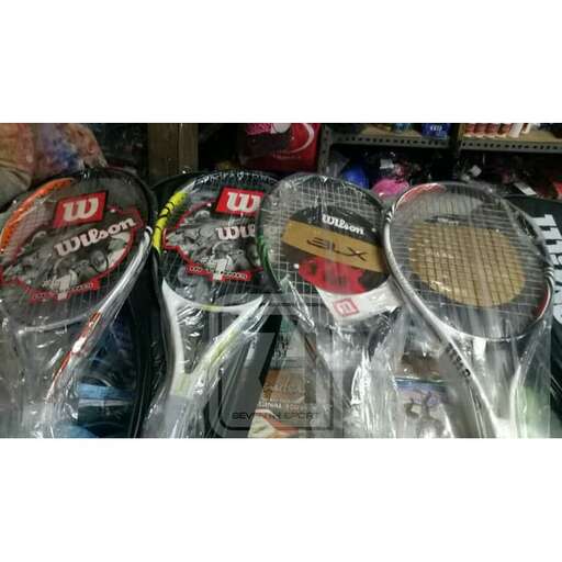 a collection of tennis rackets for sale