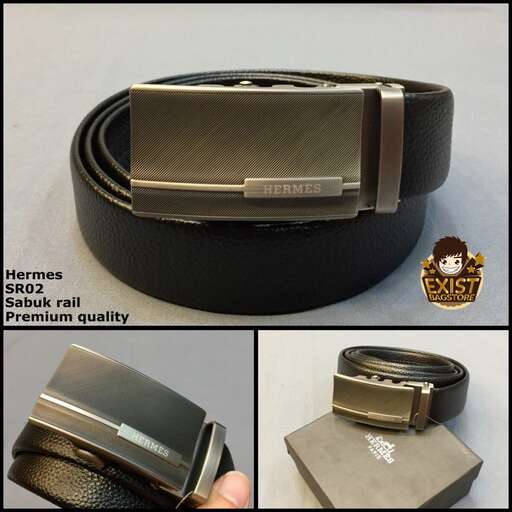 a leather belt with a leather strap and a brown and silver buckle.