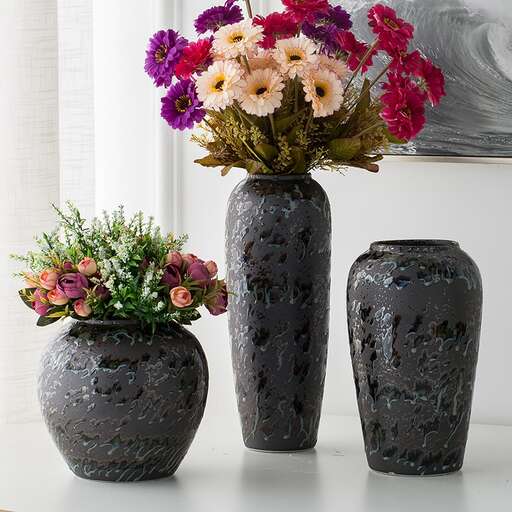 a couple of vases that are on a table