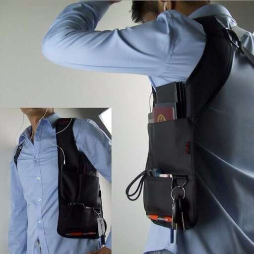 a man with a bag hanging from his shoulder.