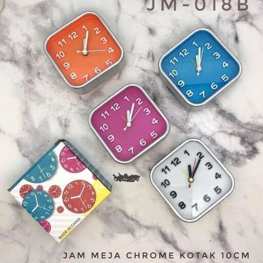a clock with different colored squares on it.