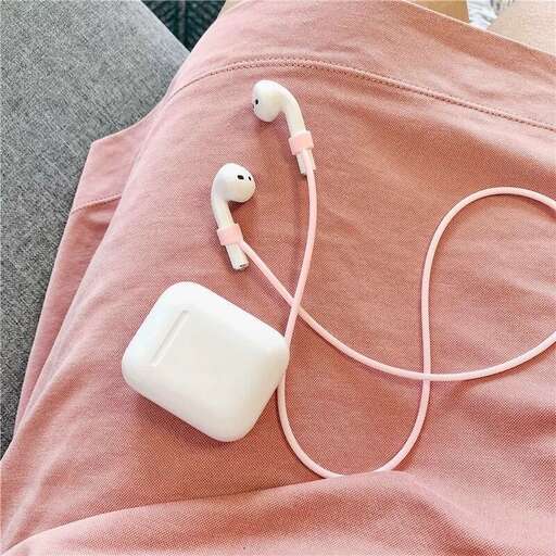 a pair of earphones sitting on a couch.