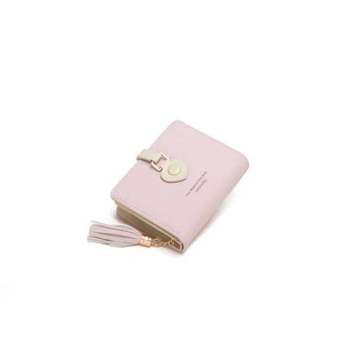 a pink wallet with a keychain in it