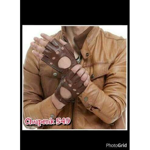 a man with brown leather gloves on his hands.