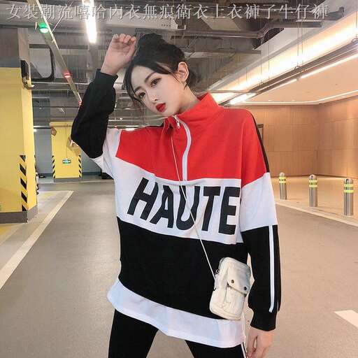 this is a model in a red and black jacket.