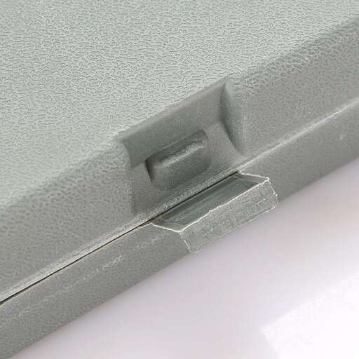 a close up of a grey metal handle