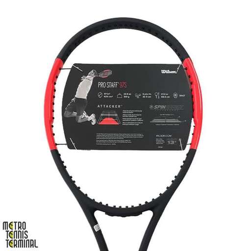 a tennis racket with a red handle