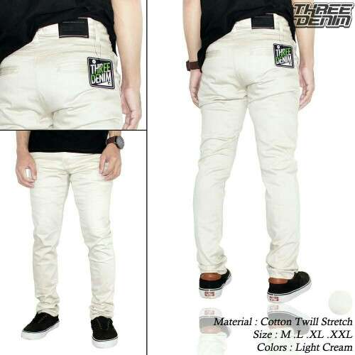 a man's white jeans with a black shirt underneath