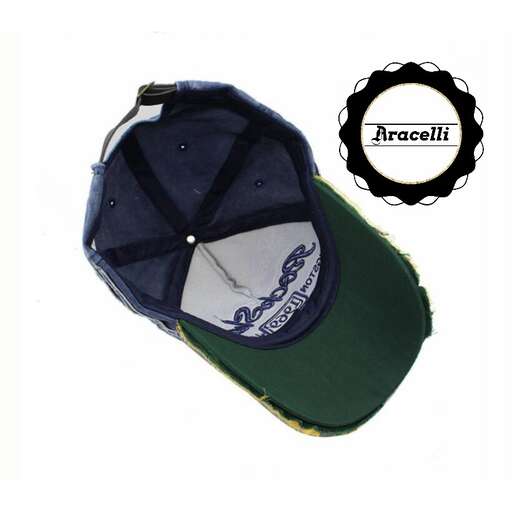a green and white hat with a black rim.