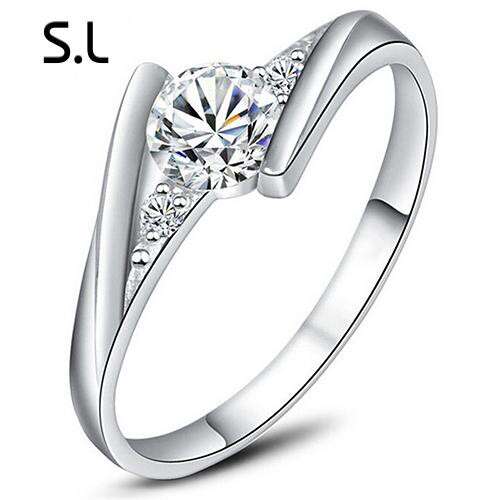 this is a simple engagement ring that is made with a single diamond.