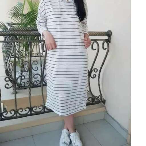 person in a striped dress