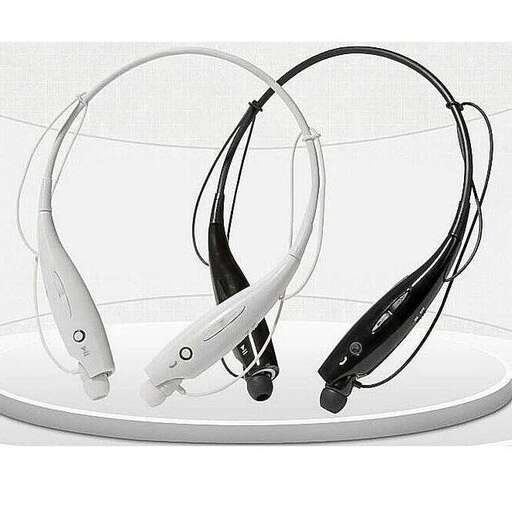 a white display stand with a pair of headphones.