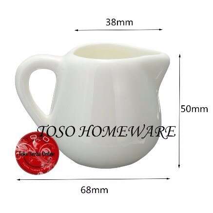 a mug with a red design on it.
