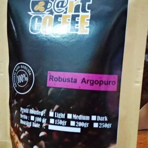 a bag of coffee with a pink label