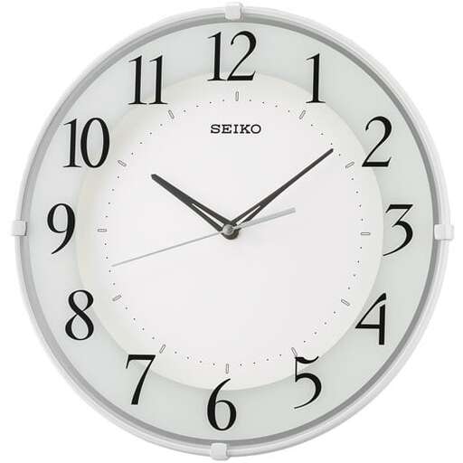 a clock with a white face and black hands