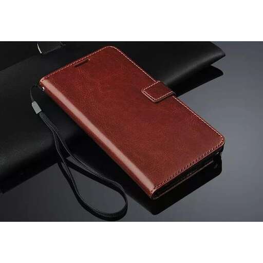 a leather wallet with a strap attached to it.