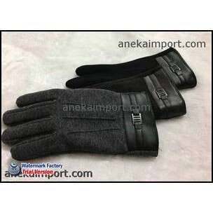 a pair of gloves with a black glove on the left.