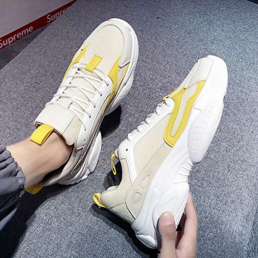 person in yellow and white sneakers.