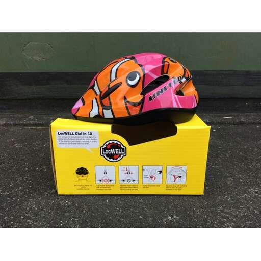 a small box with a small orange bag on top.