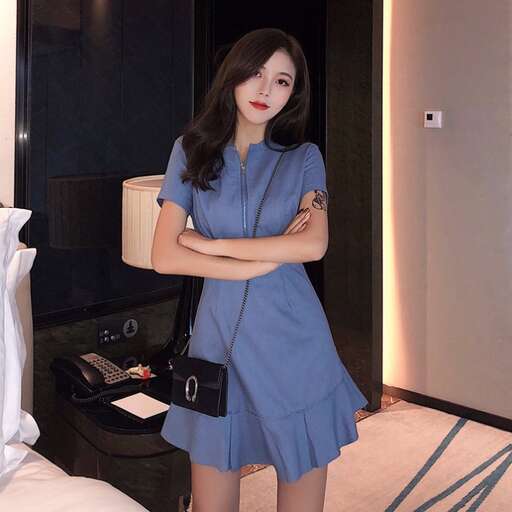 a girl in a blue dress