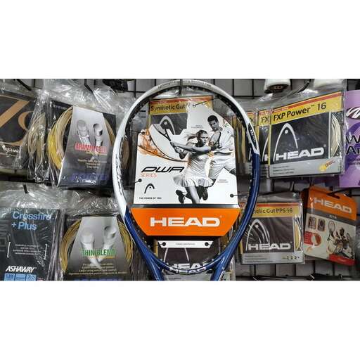 a rack of tennis rackets and other items.