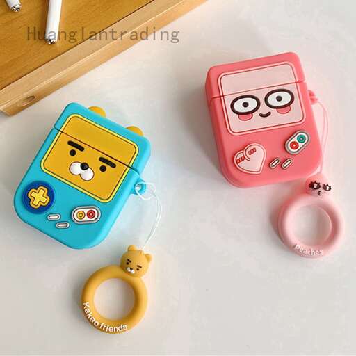 a table with a cell phone, keychain, and a keychain.