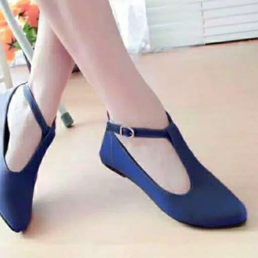 a pair of blue shoes with a strap