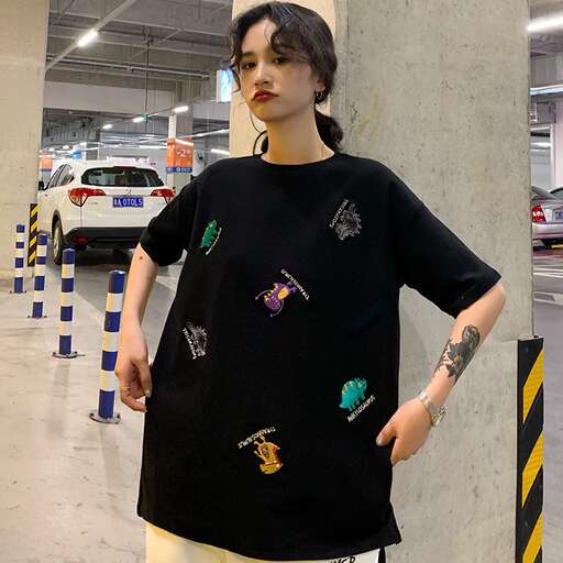 a black top with colorful designs