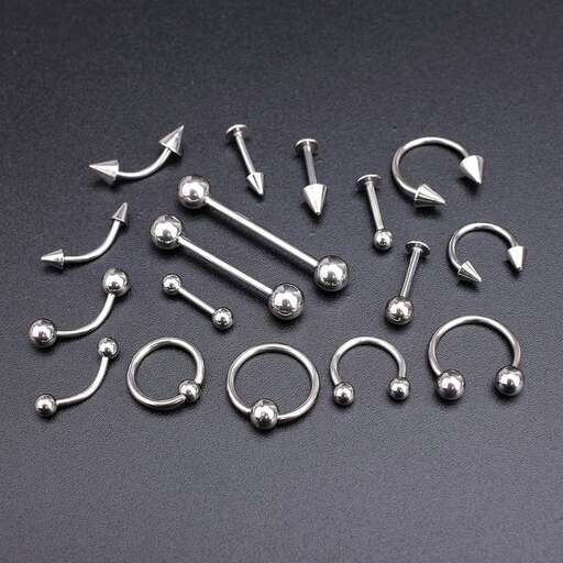 a set of silver wrench on a grey background