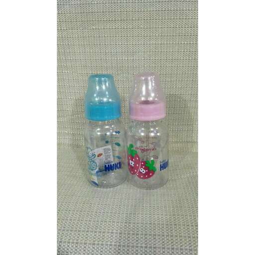 two bottles of baby food in a plastic bottle.