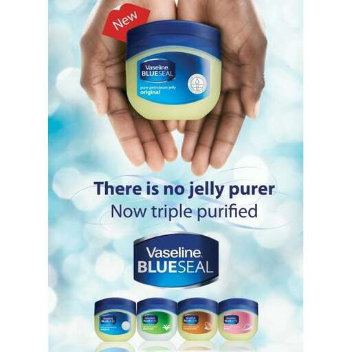 there is a bottle of soap that is being held by a person.