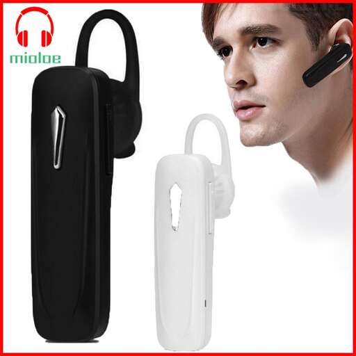 a man with earphones and a headset.