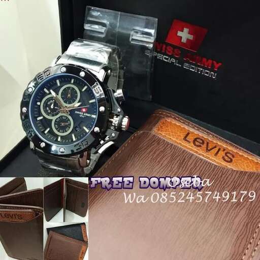 a watch and a leather case are on display.