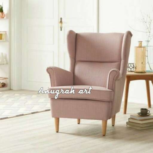 chair in pink with a side table
