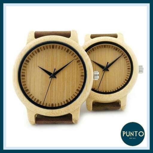 this is a wooden watch with a wooden face.